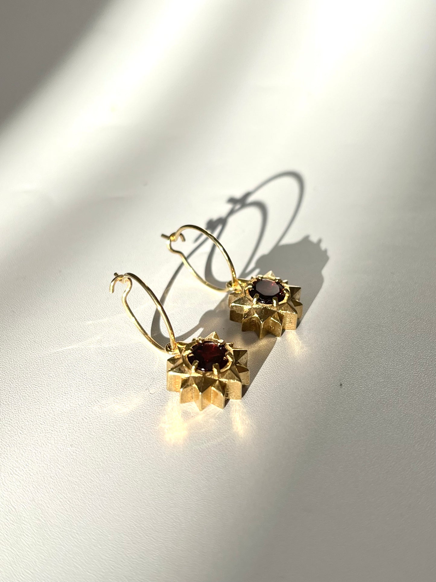 Gold Plated Stardrop Hoop earrings - with Garnets