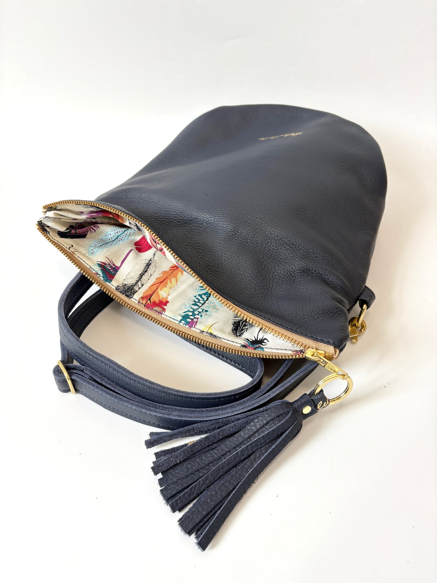 Mini Slouch - Navy leather with Feathers lining