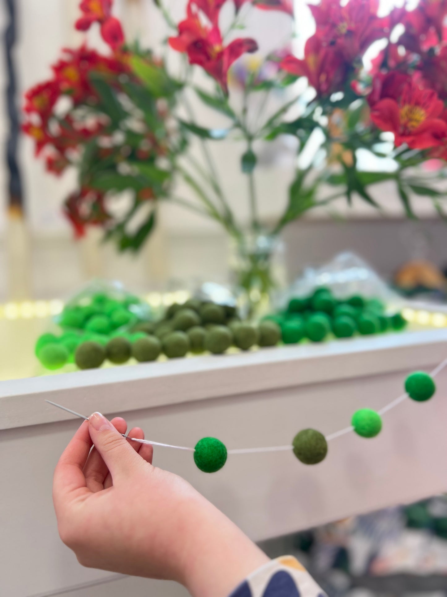 School Holiday Session - make a Pom Pom Garland at inc!