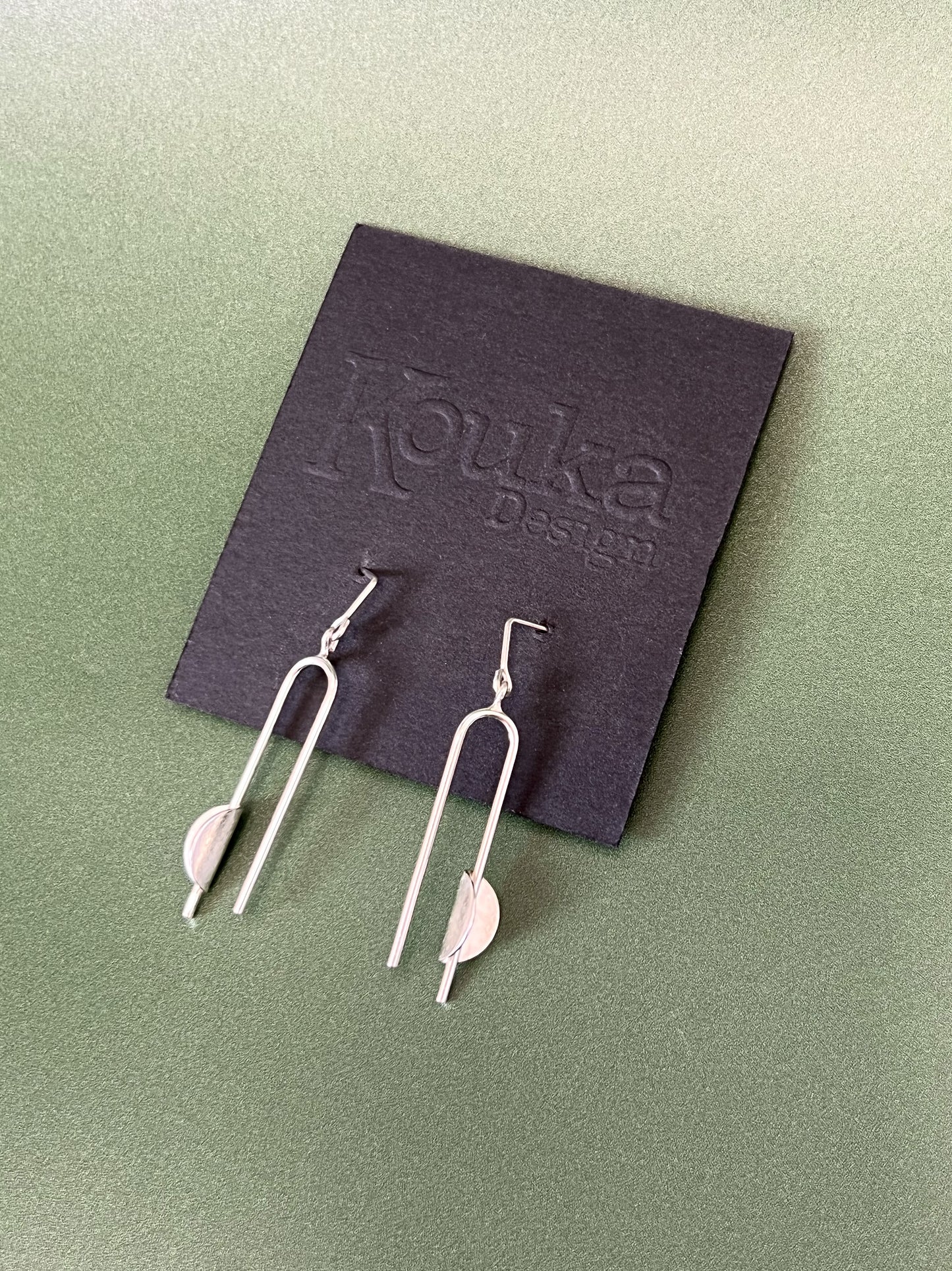 Silver N-Shape Earrings with Bent Disc