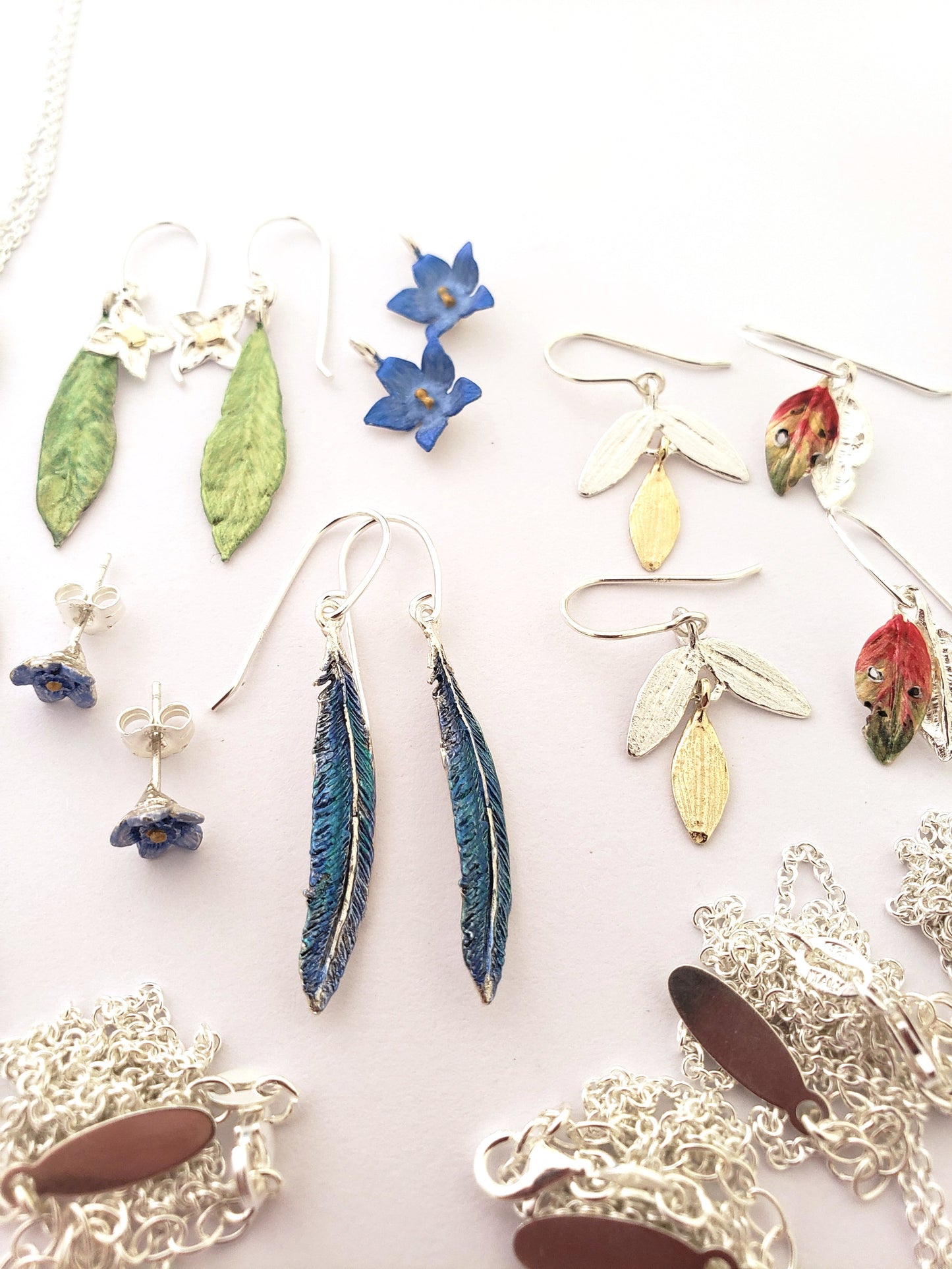 Tui Feather Earrings