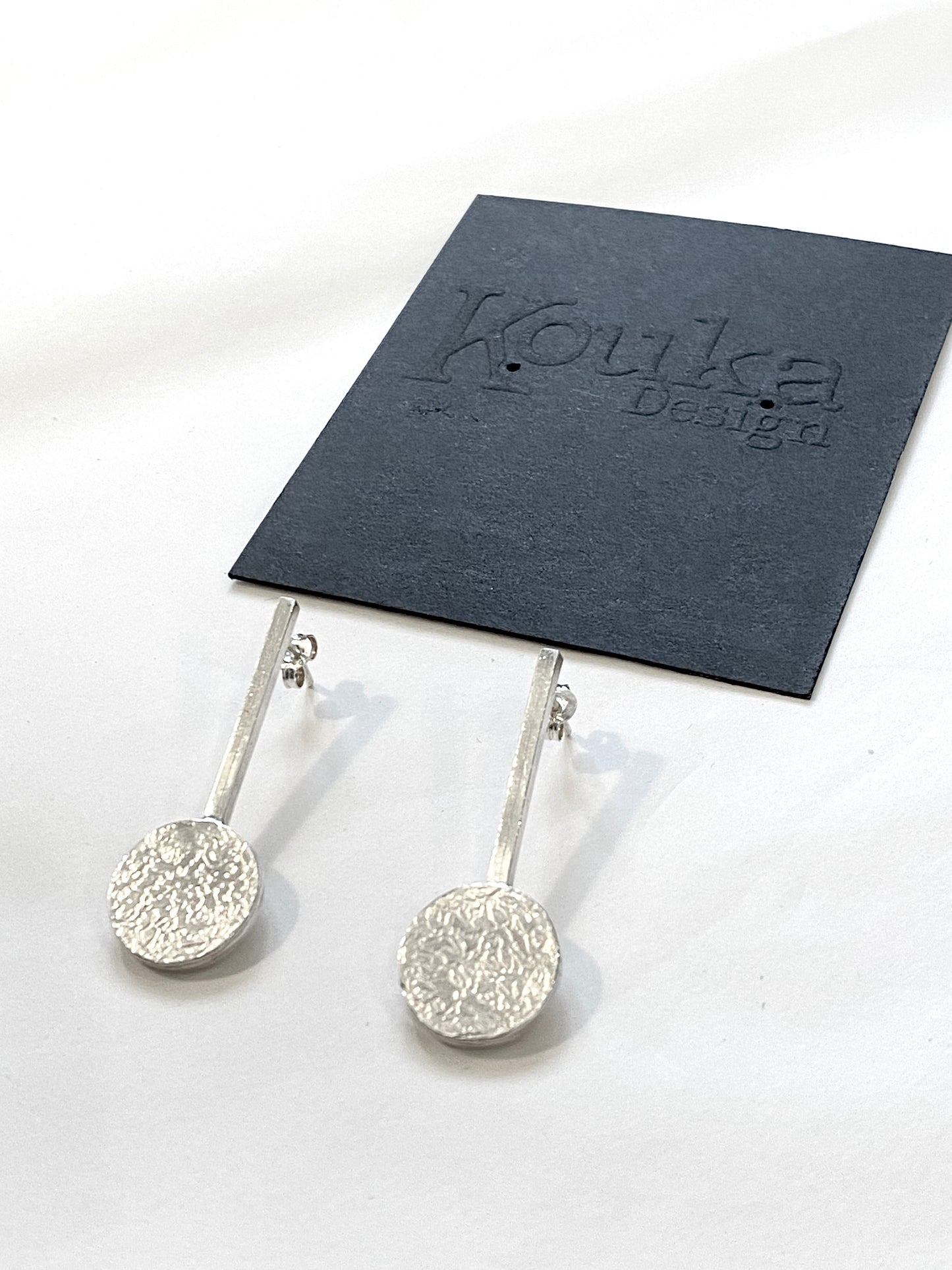 Silver textured disc on Bar earrings (#144)